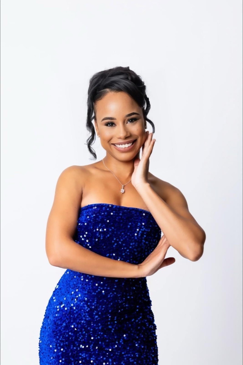 Jada in a royal-blue sequin gown, studio portrait