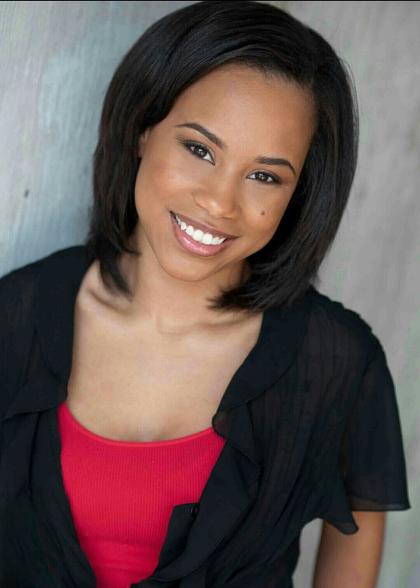 Jada Nicole Howard — headshot in black jacket